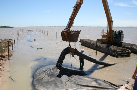 GEOTUBE® container being filled with dredged material. (Photo: Tencate)
