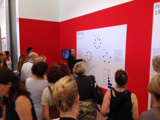 Volume's editor-in-chief Arjen Oosterman giving a tour of the exhibition