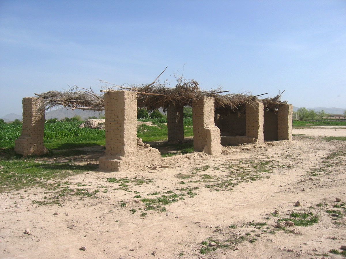 Uruzgan featured very little school buildings prior to the ISAF intervention. Although basic ‘education’ was being facilitated in private houses, mosques, or in open-air structures, as seen here.